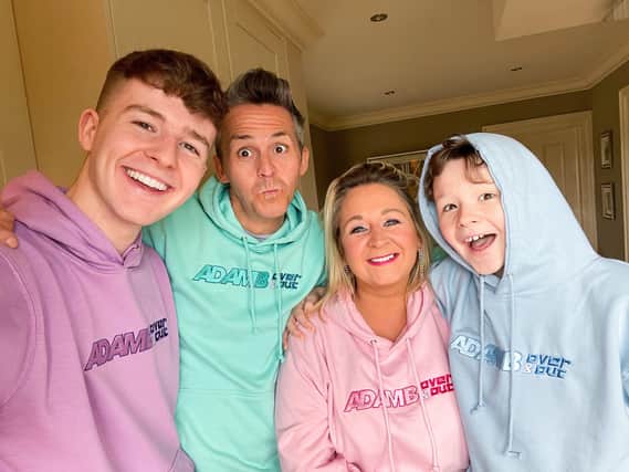 Adam B with his family in his new merchandise collection
