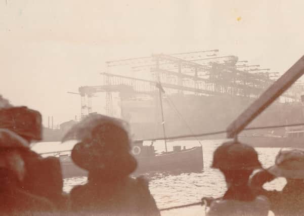 A sepia photo of the RMS Olympia launch