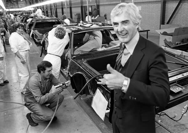 John DeLorean on the production line of his Dunmurry factory in October 1981. Pacemaker Press Intl