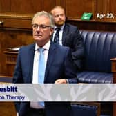 Mike Nesbitt in the chamber today; behind him is John Stewart, who moved the motion alongside Doug Beattie