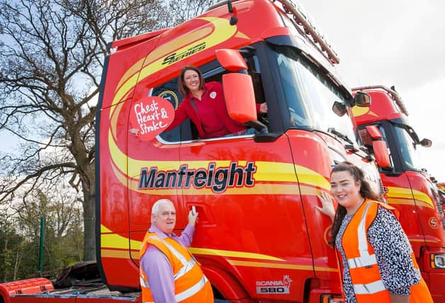 Emma McCrudden, Programme Manager of Work Well Live Well from NICHS with Aisling Murphy and Paddy Halligan, Health Champions at Manfreight Limited