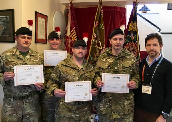 Former Royal Fusiliers captain Andrew Rawding, far right, with some serving members of the regiment he has trained in suicide awareness.