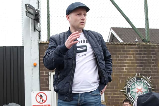 Jamie Bryson standing on a bin in Newtownards during a protest earlier this week. Photograph by Declan Roughan/Press Eye