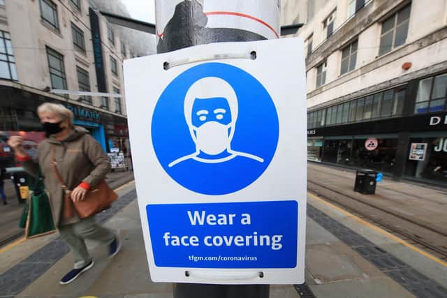 Face coverings must still be worn indoors as restrictions are eased.