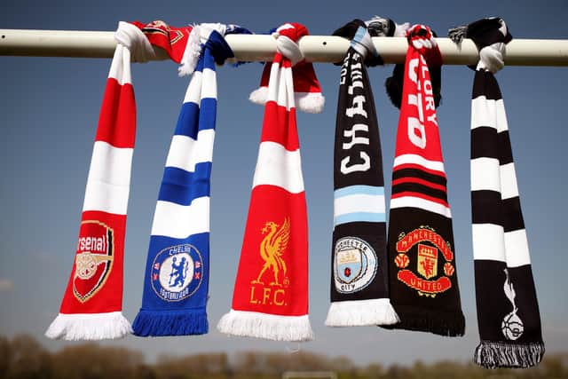 A selection of of Arsenal, Chelsea, Liverpool, Manchester City, Manchester United and Tottenham Hotspur scarves.