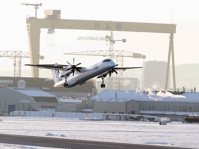 Travel throughout Northern Ireland tries to get by to normal as snow and icy conditions still effect parts of the country in December 2010.  A plane takes off at George Best Belfast City Airport. Picture: Jonathan Porter/Presseye.com