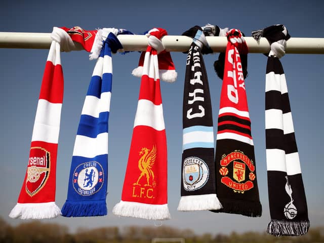 File photo dated 19-04-2021 of a selection of of Arsenal, Chelsea, Liverpool, Manchester City, Manchester United and Tottenham Hotspur scarves. Picture date: Monday April 19, 2021. Issue date: Wednesday April 21, 2021.