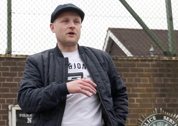 Jamie Bryson speaking at a loyalist protest in Newtownards