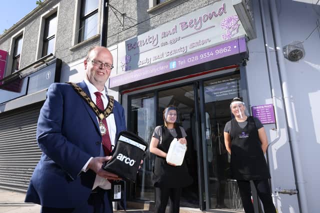 Mayor, Cllr Jim Montgomery delivers a Covid Pack to Beauty and Beyond, Ballyclare