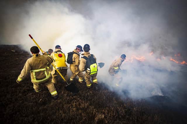 1
Firefighters are continuing to tackle a large gorse fire in the Slieve Donard area of the Mourne Mountains for the second day.
 Picture: Conor Kinahan/Pacemaker Press.