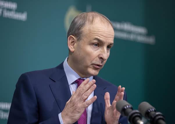 Handout photo issued by Julien Behal Photography of Taioseach Micheal Martin during a press briefing at Government Buildings, Dublin,