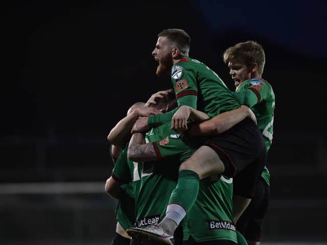 Glentoran celebrate going 3-2 up after Fuad Sule’s own goal