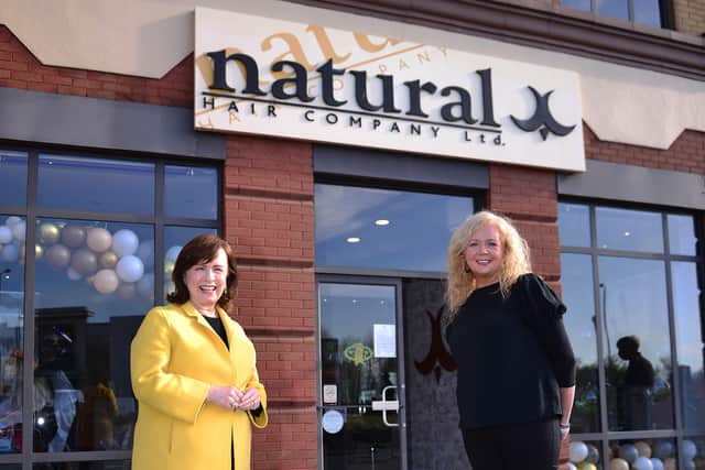 Economy Minister Diane Dodds pictured with salon owner Martine Broggy and client Lorraine Calvert at the reopening of Natural Hair Company in Lisburn