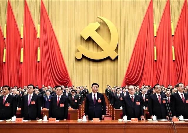 Image (from PA) of Xi Jinping - the Chinese leader (centre) - at a communist party gathering