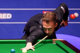 Judd Trump plays a shot during the Betfred World Snooker Championships 2021 at The Crucible, Sheffield.