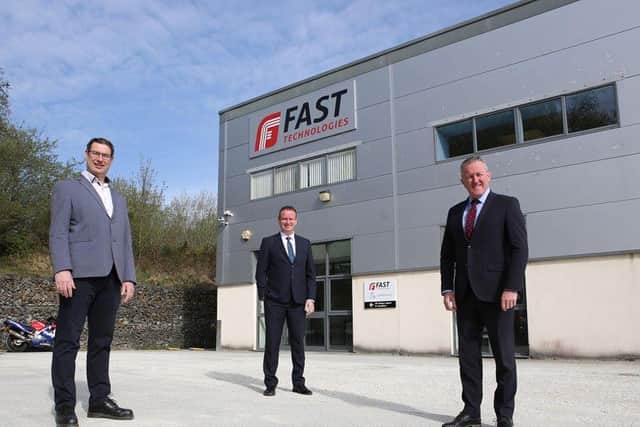 Finance Minister, Conor Murphy, Mark Higgins, Director of Operations FAST Technologies and Stephen Kelly, CEO of Manufacturing NI