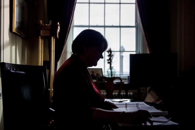 Arlene Foster at work in her Stormont office last month. She will quit as DUP leader on May 28. Photo: Liam McBurney/PA Wire