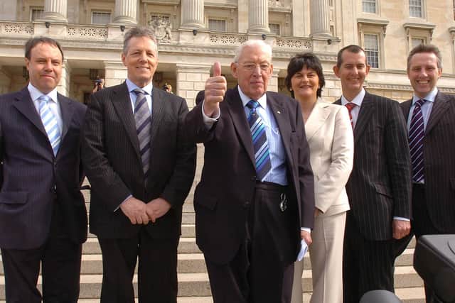 Arlene Foster in April 2007 with the then 
DUP leader Rev Ian Paisley, First Minister designate, as he announced his ministerial team. From left Nigel Dodds, Peter Robinson, Edwin Poots and Ian Paisley junior. The DUP gave Mrs Foster golden opportunities. 
Photo Pacemaker