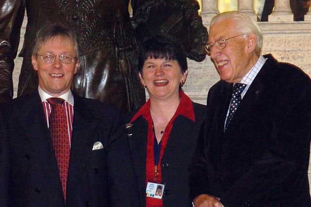 Arlene Foster with Peter Robinson and Ian Paisley after defecting to the DUP from the UUP in 2004