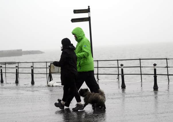 Wet Weather at Whitehead  in Co Antrim. Pic Colm Lenaghan/Pacemaker