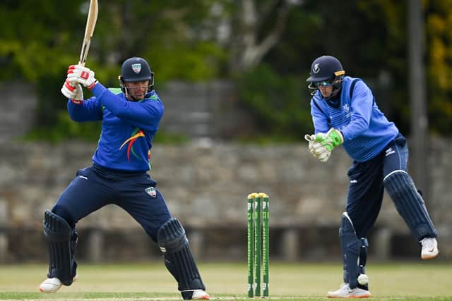 Graham Hume of North West Warriors playes a shot past Leinster Lightning wicketkeeper Lorcan Tucker during the Inter-Provincial Cup 2021 match between Leinster Lightning and North West Warriors at Pembroke Cricket Club in Dublin. Photo by Brendan Moran/Sportsfile