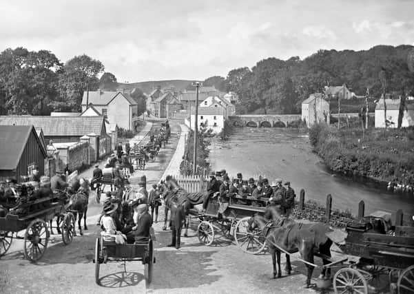 Pilgrims starting from Pettigo, Co Fermanagh, for Lough Derg, Co Donegal. NLI Ref: L_ROY_10811. Picture: National Library of Ireland
