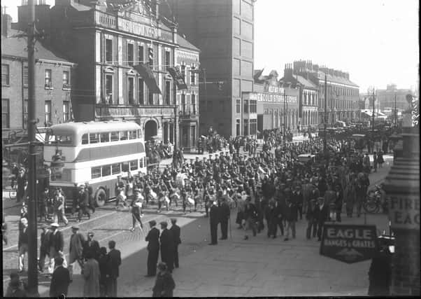 A recruiting march down Great Victoria Street, Belfast in July 1937. Catalogue number:  BELUM.Y5144. AR Hogg, © National Museums NI, Collection Ulster Museum