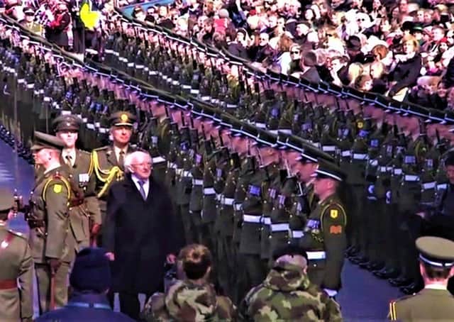 Michael D Higgins inspects the ranks of the Irish Army at the 1916 commemoration