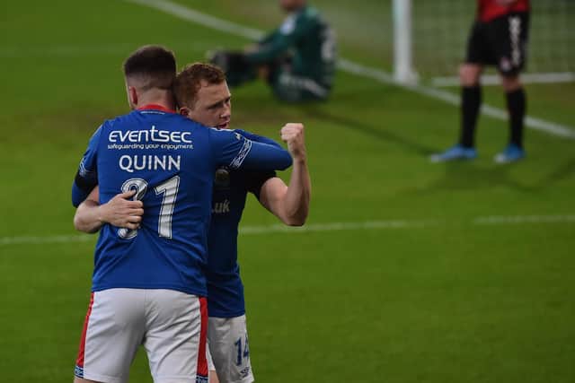 Shayne Lavery celebrates his goal with Niall Quinn