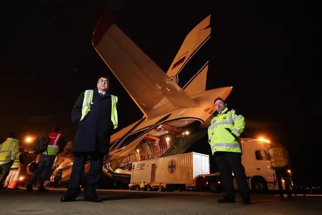 Health Minister Robin Swann (right) and Deputy Chief Medical Officer Naresh Chada at Belfast Airport as the world's largest cargo plane leaves Northern Ireland with three 18-tonne oxygen generators and 1,000 ventilators as part of the UK's latest response to India's Covid-19 crisis.