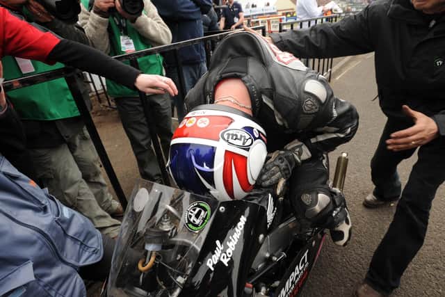 Paul Robinson was overcome with emotion after winning the 125cc race at the North West 200 in 2010 - 30 years after his father, Mervyn was killed in a crash at the event.