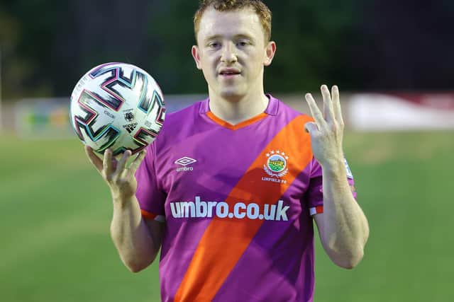 Shayne Lavery with the match ball after his hat-trick for Linfield