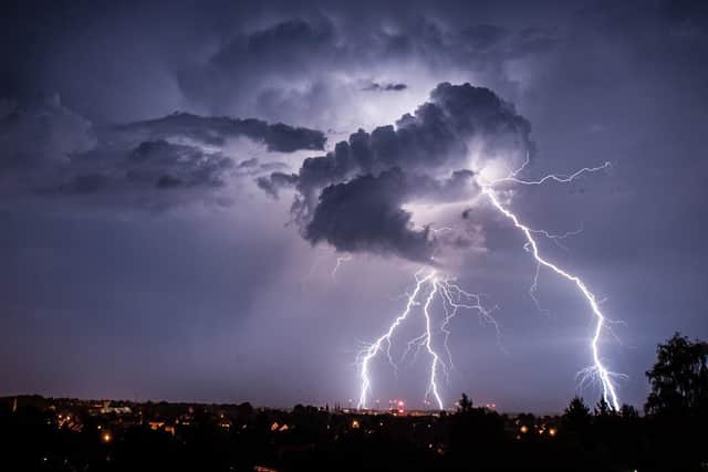 Lightning strikes from a cloud during a thunderstorm