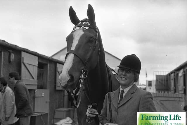 Ronnie Bailey wears that unmistakable sign success â€“ and for good reason: Rock Ann, owned by Billy Clingham of Banbridge, had just won the middle-weight four-year-old hunter class at the Balmoral Show in May 1991. Picture: News Letter/Farming Life archives|