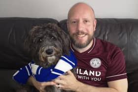 News Letter journalist Graeme Cousins with the latest recruit to the Northern Ireland Leicester City fan club - his dog Shadow