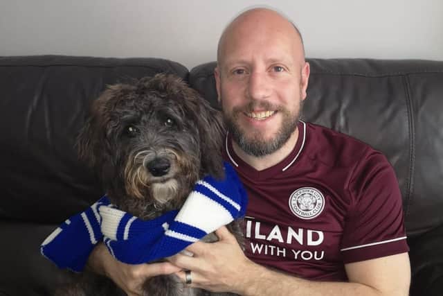 News Letter journalist Graeme Cousins with the latest recruit to the Northern Ireland Leicester City fan club - his dog Shadow
