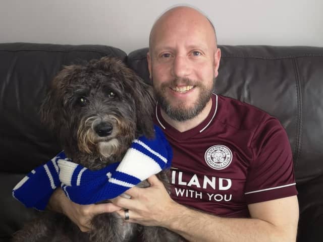 News Letter journalist Graeme Cousins with the latest recruit to the Northern Ireland Leicester City fan club - his dog Shadow