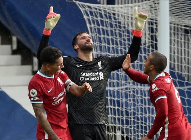 Liverpool goalkeeper Alisson Becker pays a special tribute to his late father. Pic by PA.