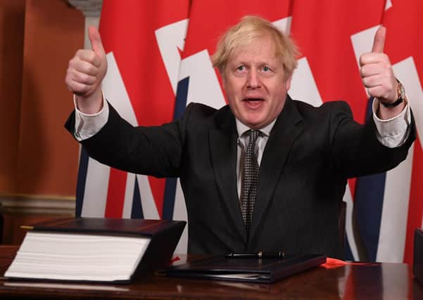 Boris Johnson gives a thumbs up gesture after signing the EU-UK trade deal in Downing Street last December. Henry Hill writes: "The prime minister and his ministers are British nationalists, if they are any sort of nationalist at all" Photo: Leon Neal/PA
