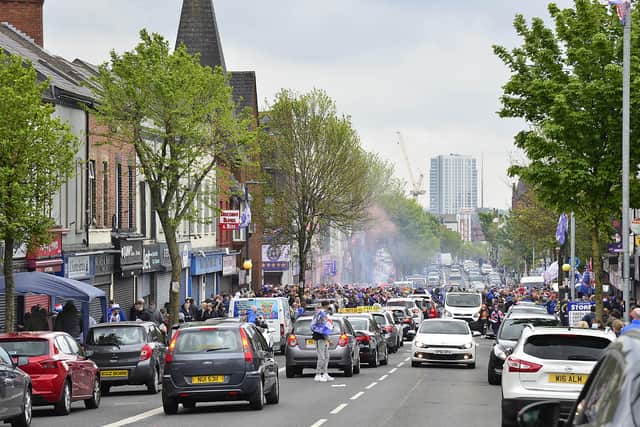A large crowd has gathered on Belfast's Shankill Road to celebrate Rangers winning the Scottish Premiership. The fans came out despite a ban on public gatherings under coronavirus restrictions to mark the Glasgow side's first title in a decade.
Picture By: Pacemaker.