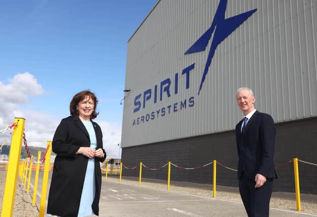 Economy Minister Diane Dodds with Spirit AeroSystems vice president and general manager Michael Ryan on the factory floor during a tour of the wing factory