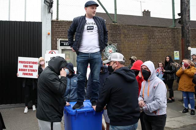 Jamie Bryson was mocked for delivering  a speech against the Irish Sea border from atop a blue wheelie bin outside the PSNI station in Newtownards last month. Photograph by Declan Roughan / Press Eye