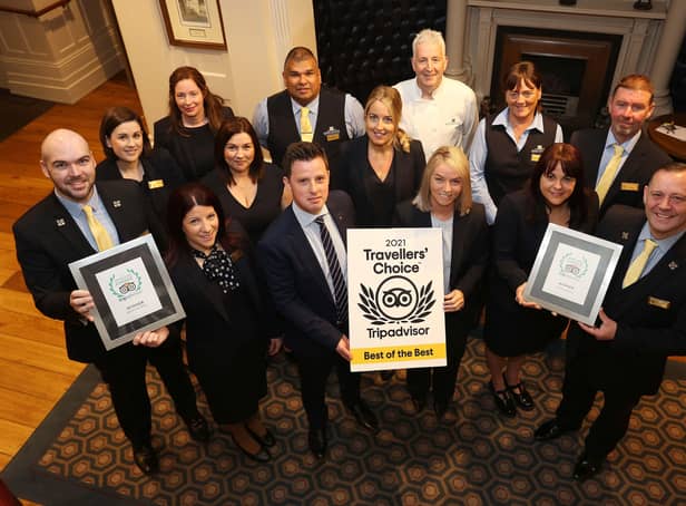 Staff and management at Bishop’s Gate Hotel with the TripAdvisor Travellers’ Choice Award