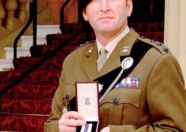 Doug, who has over 28 years military service, was awarded the prestigious Military Cross