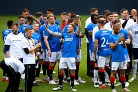Rangers players celebrate on the pitch after winning the Scottish Premiership; no criminality was found by police