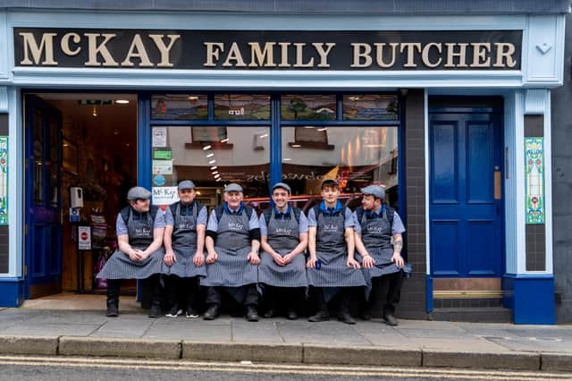 Father and Son, Sean and Fergal (centre) are flanked by their team of local butchers