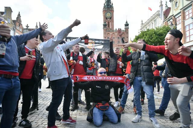 Manchester United fans are seen around the city of Gdansk before the UEFA Europa League final, at Gdansk Stadium, Poland, on Wednesday.