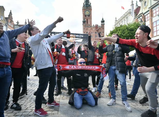 Manchester United fans are seen around the city of Gdansk before the UEFA Europa League final, at Gdansk Stadium, Poland, on Wednesday.