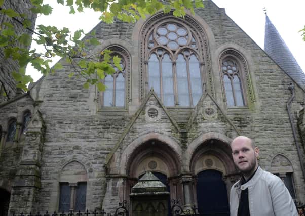 Assistant Minister Jonathan Abernethy-Barkley pictured outside Fitzroy Presbyterian Church, University Street, Belfast, in October 2014. Picture: Colm Lenaghan/Pacemaker Press