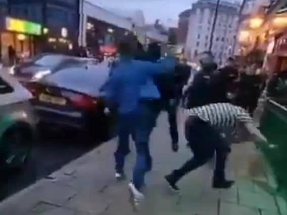 A violent brawl breaks out as a doorman says to two men from Northern Ireland to "go back where you f*****g came from".